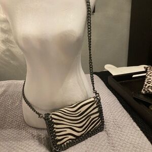 German Fuents Italian leather, zebra hair Purse with decorative stitching.